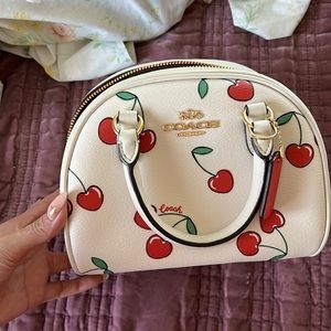 Cherry coach purse